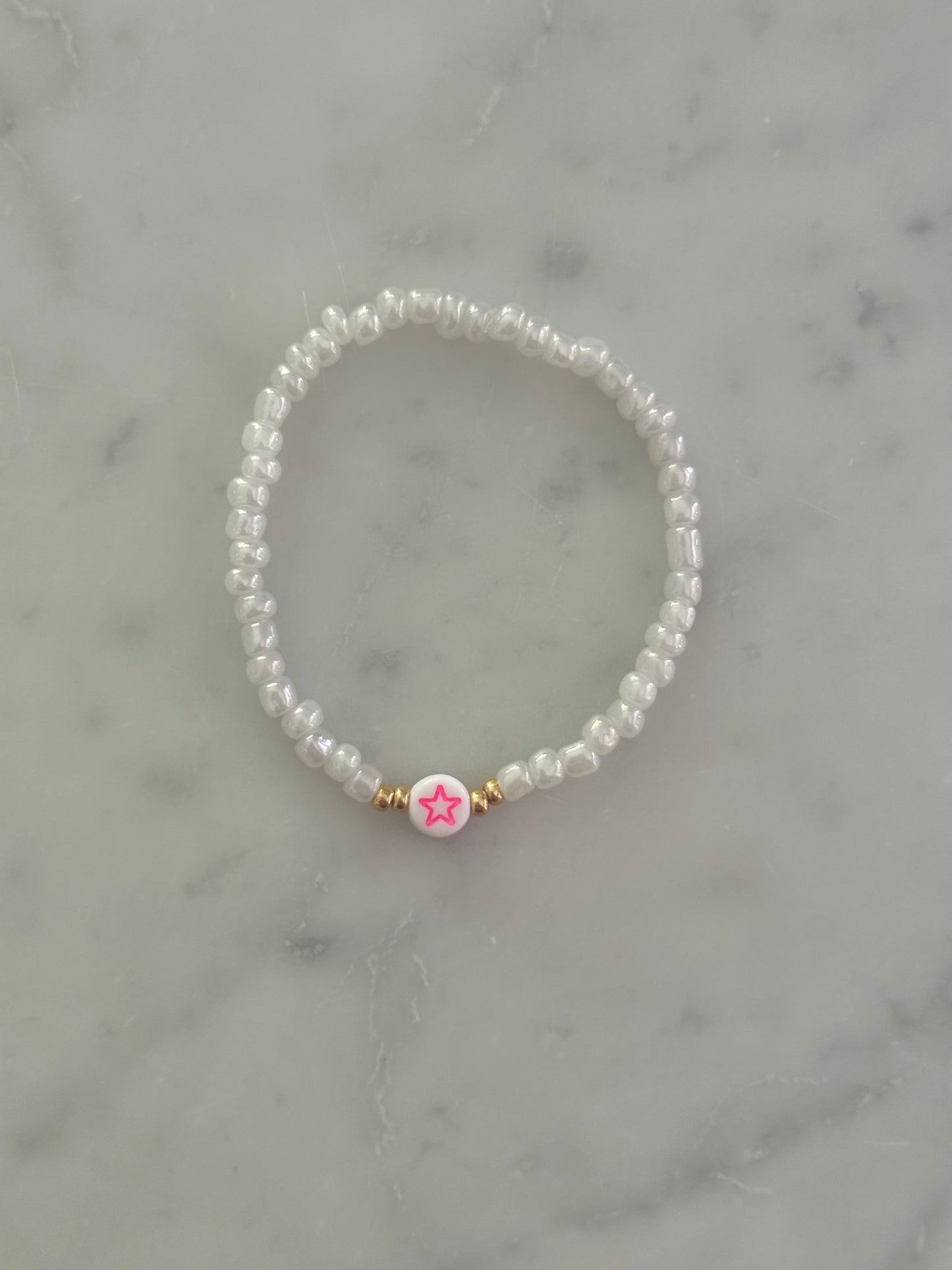 pink symbol bracelet