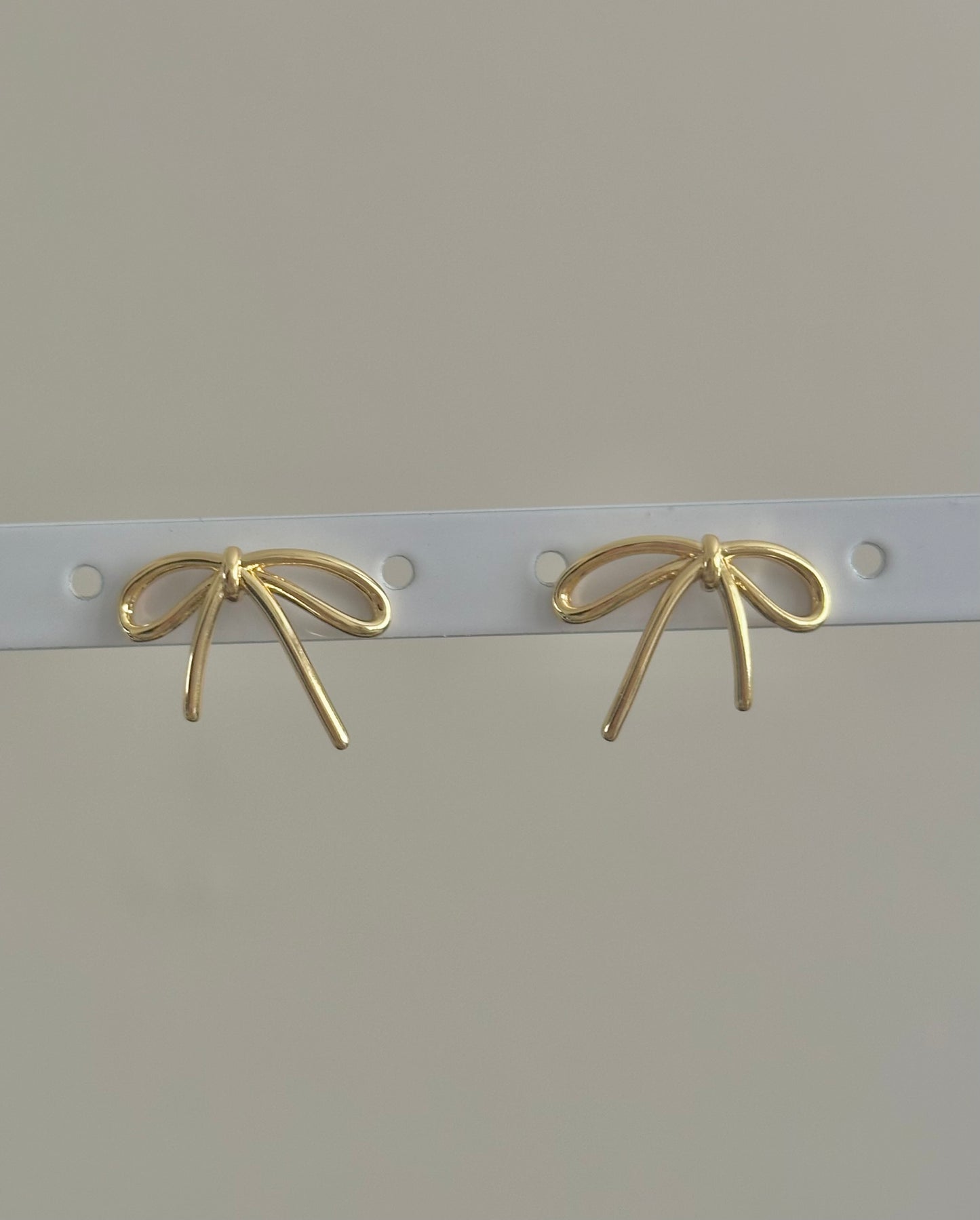 gold string bow gold filled earrings
