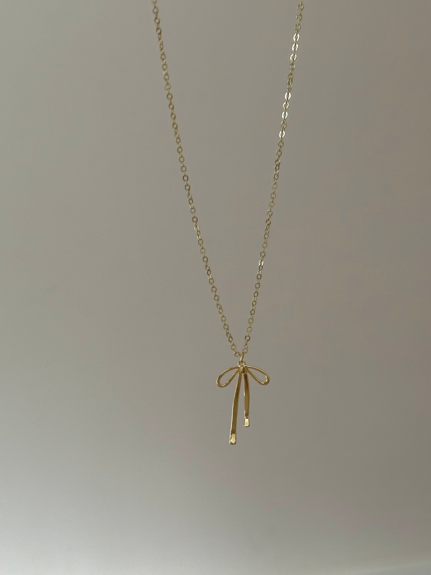 minimalist ribbon bow gold filled necklace