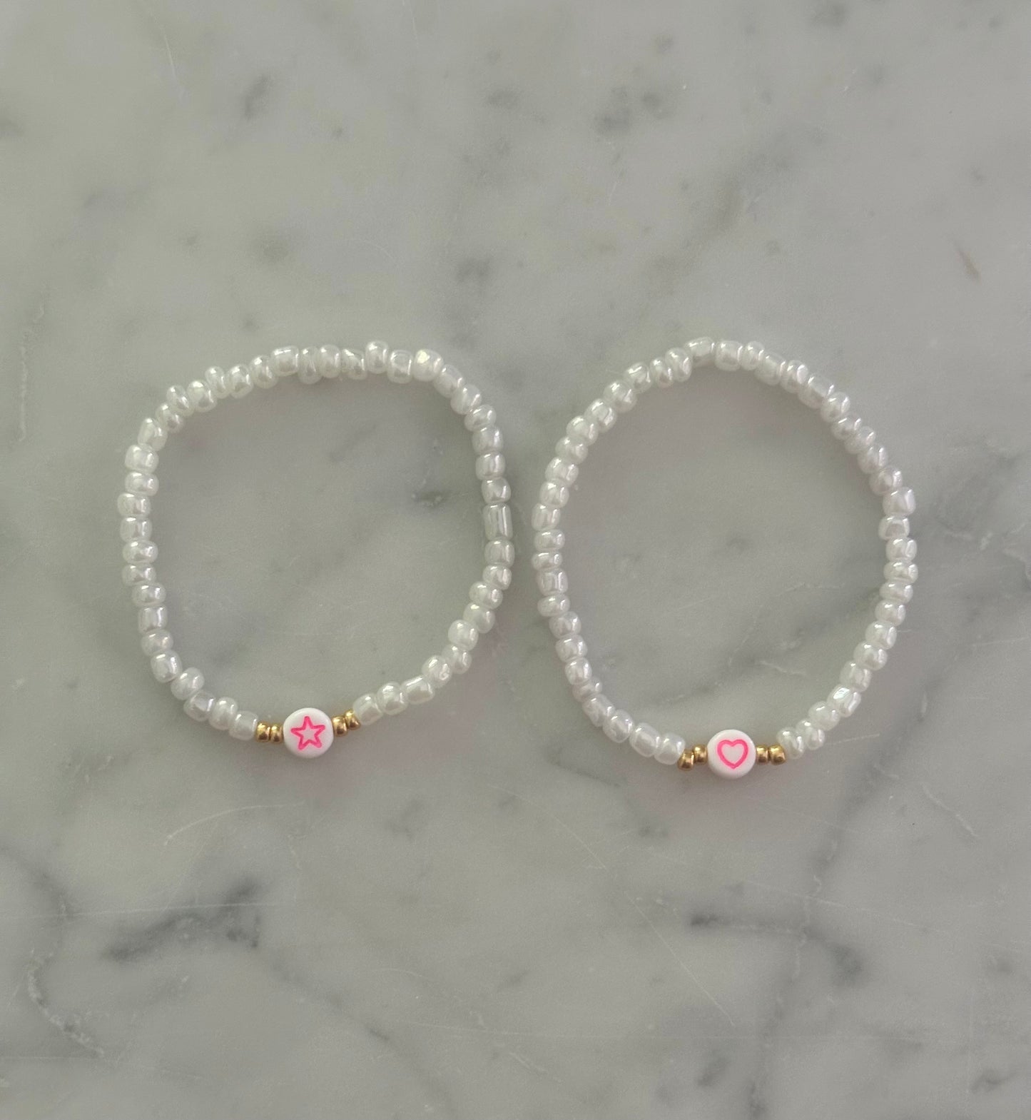 pink symbol bracelet