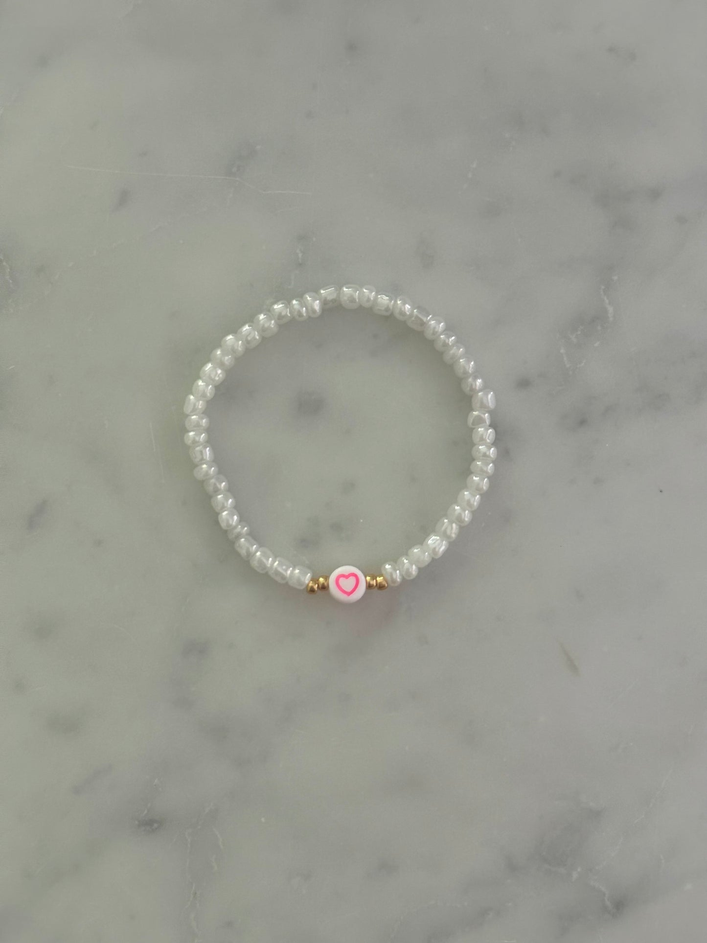 pink symbol bracelet