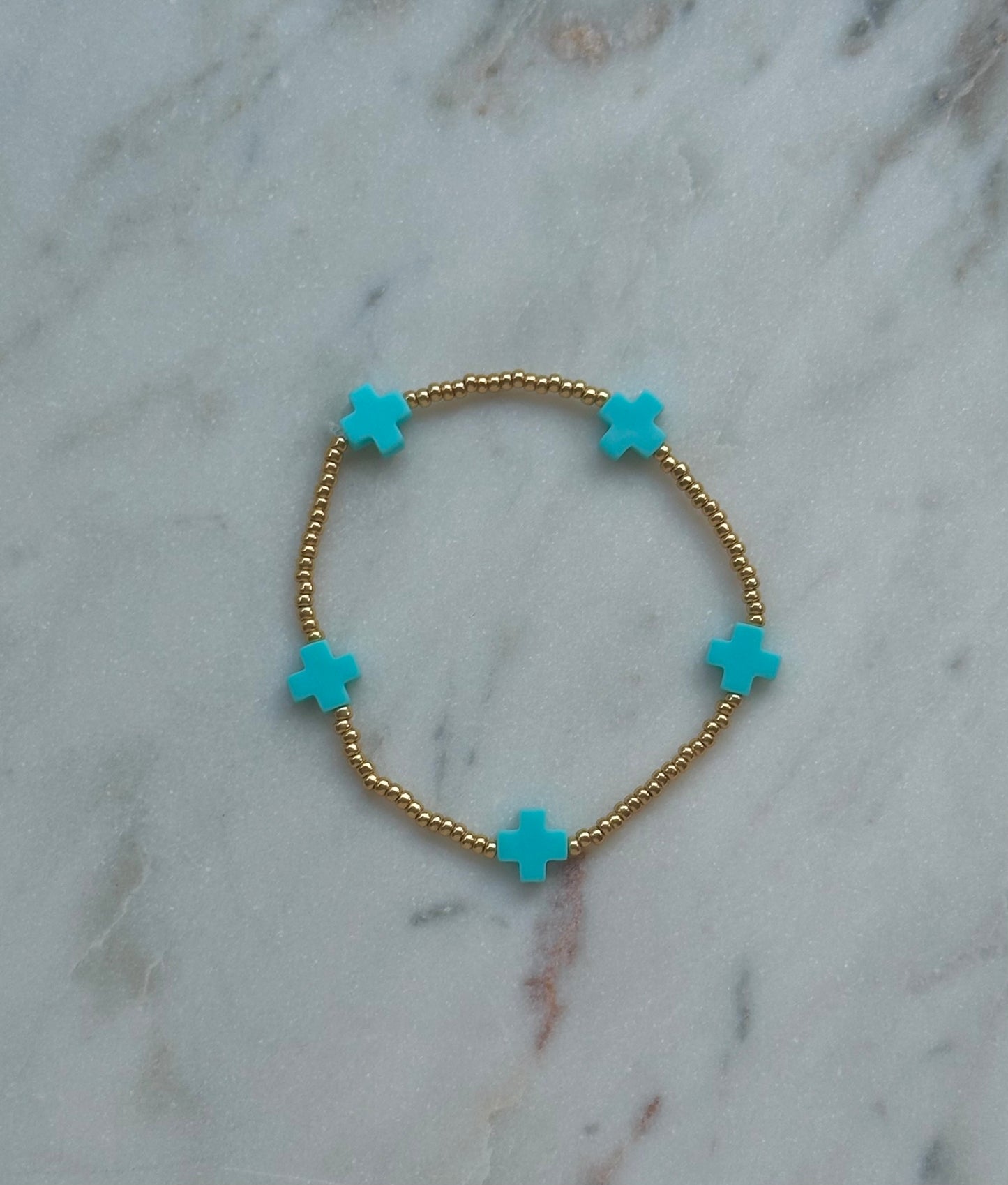 blue cross bead bracelet