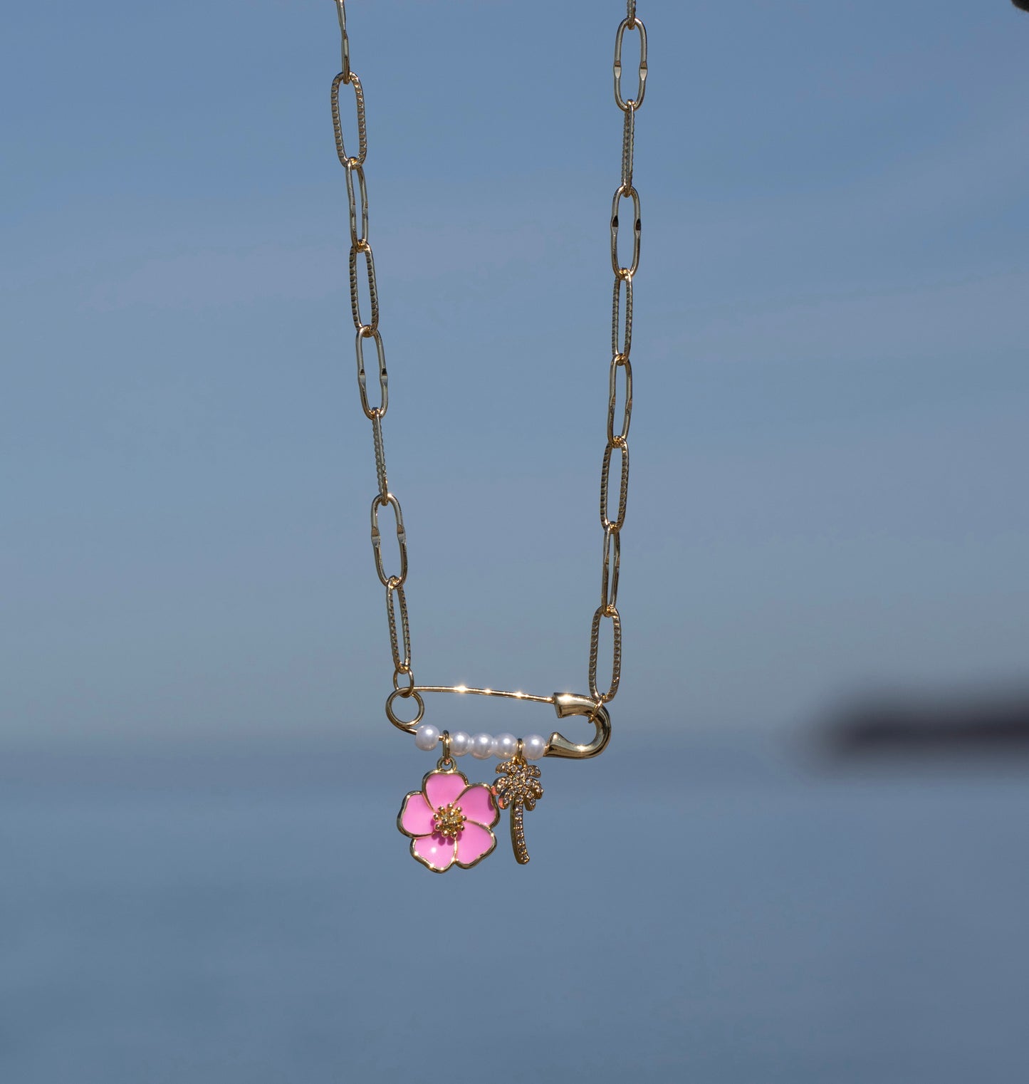 pink hibiscus charm necklace