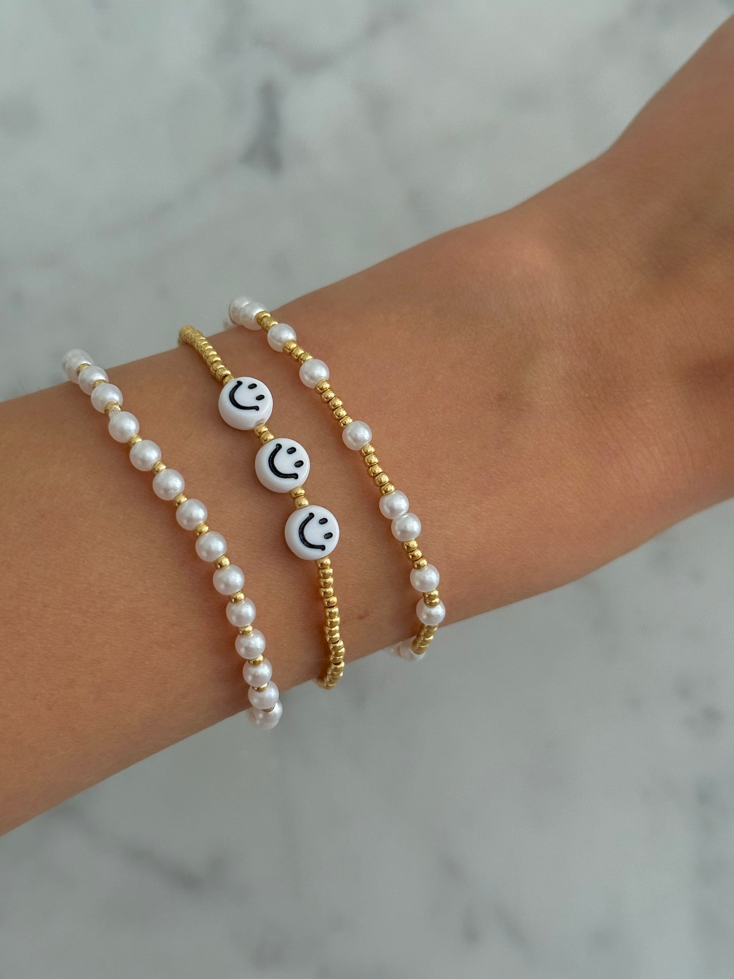 gold and pearl stacking bracelet