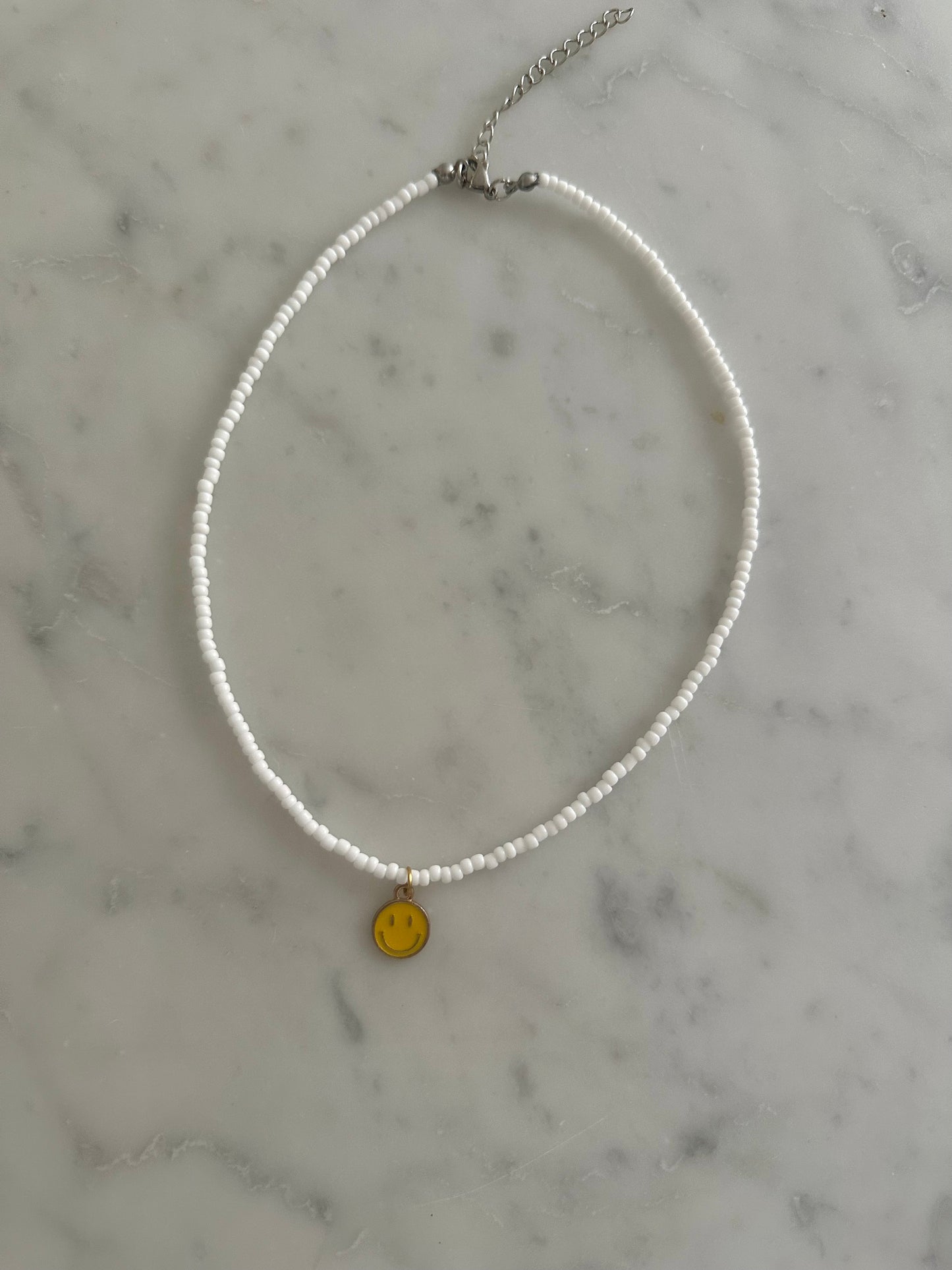 yellow smiley charm necklace