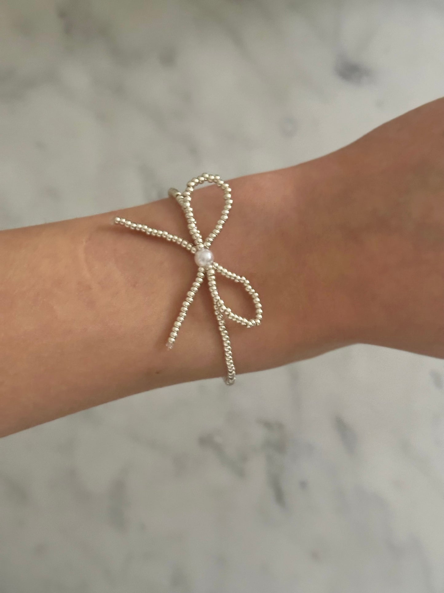 silver bow bracelet