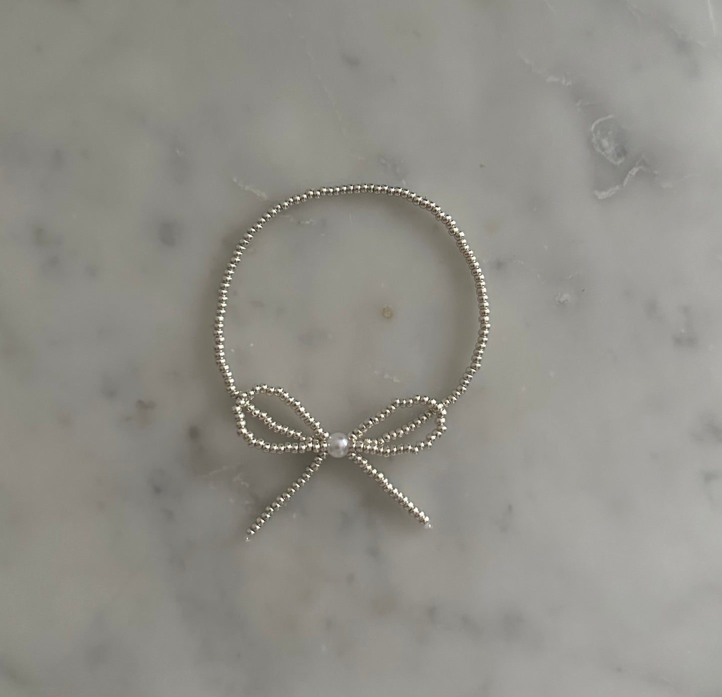 silver bow bracelet