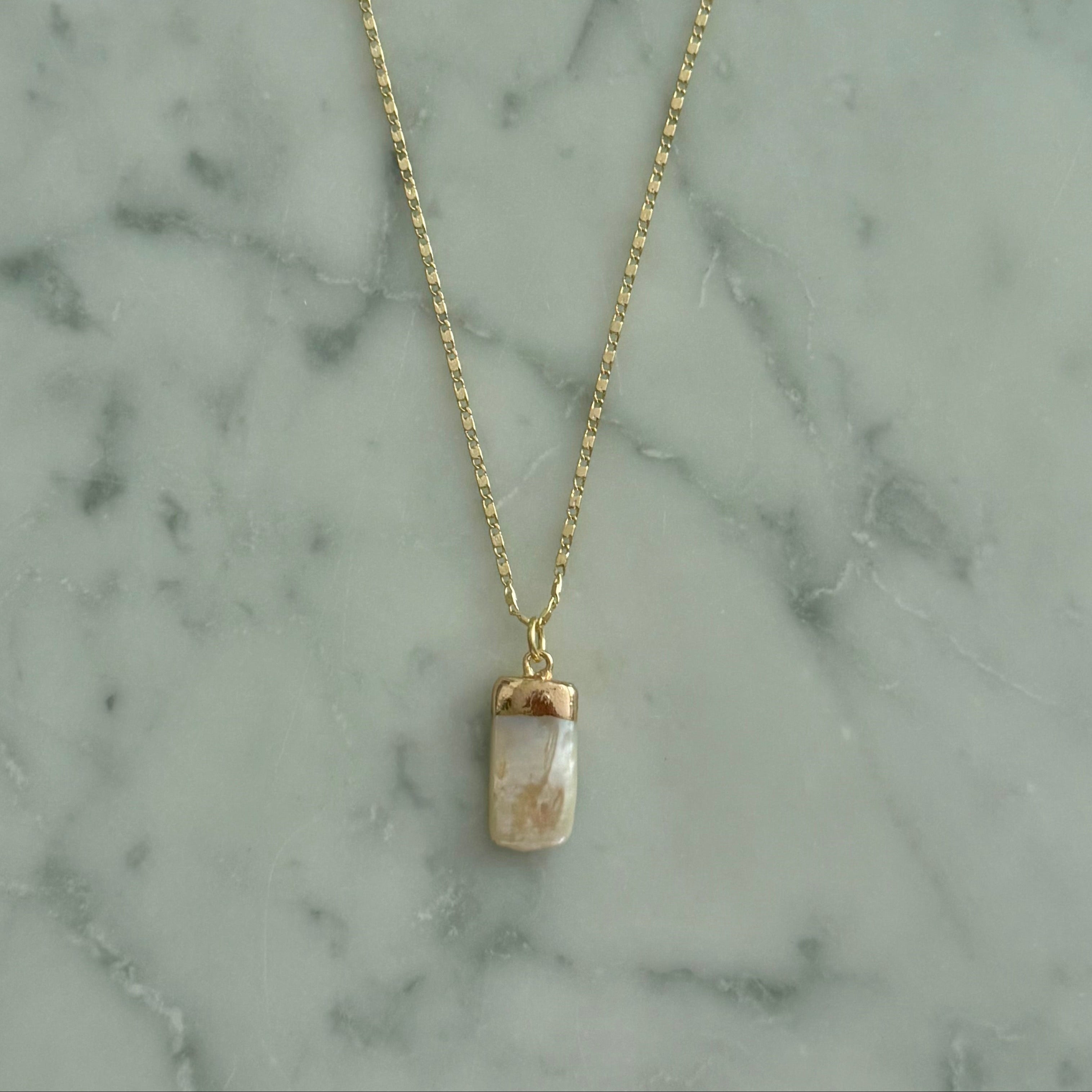 all necklaces – ivory moon