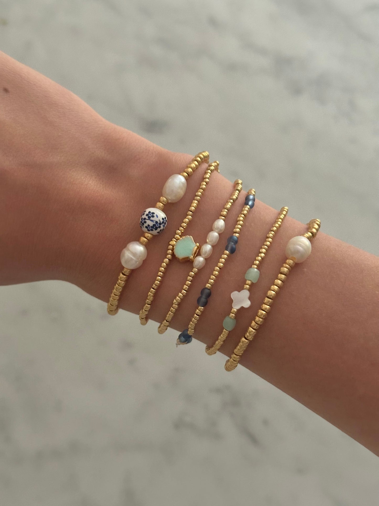 blue and gold stacking bracelet