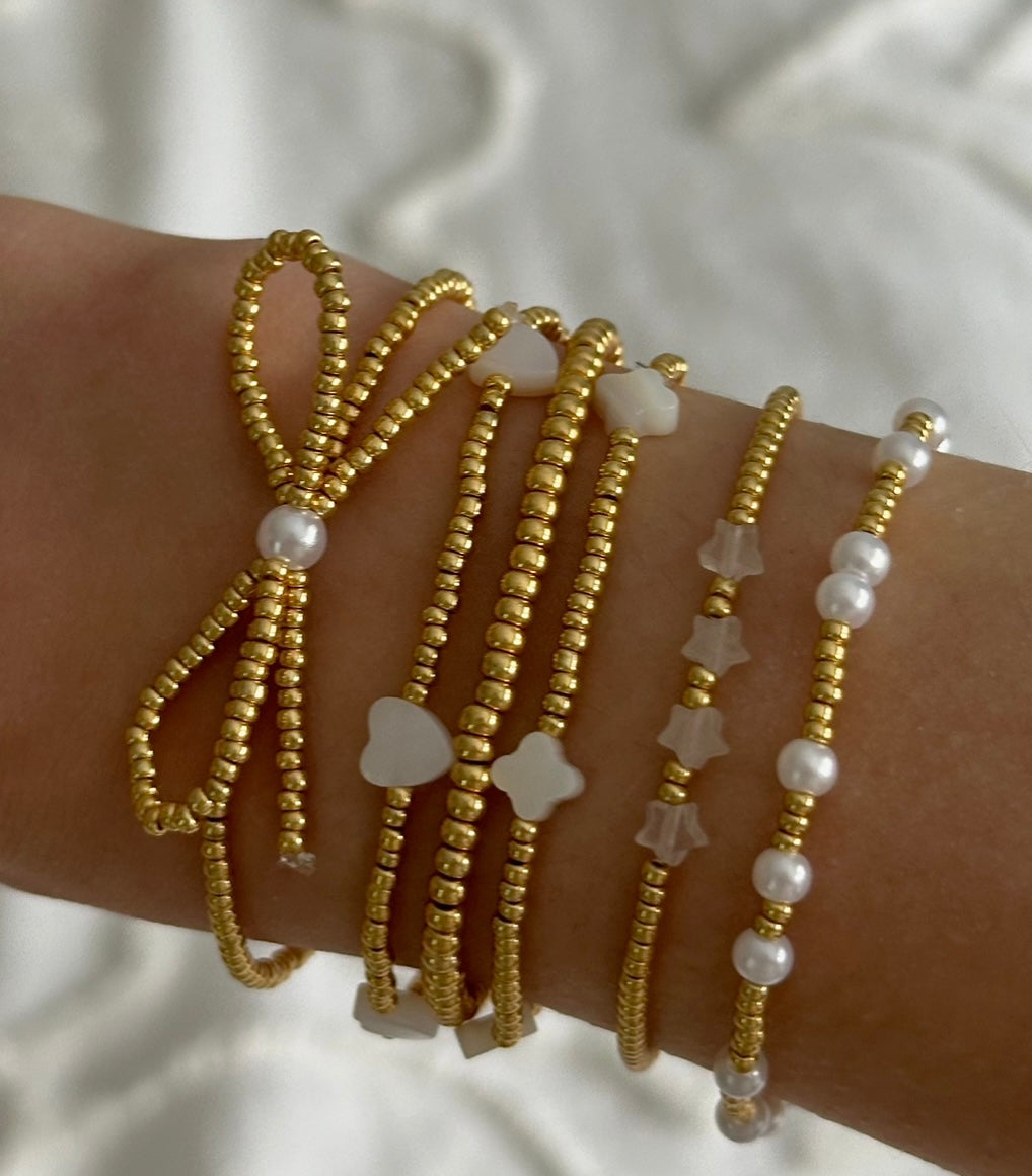 gold beaded bow bracelet