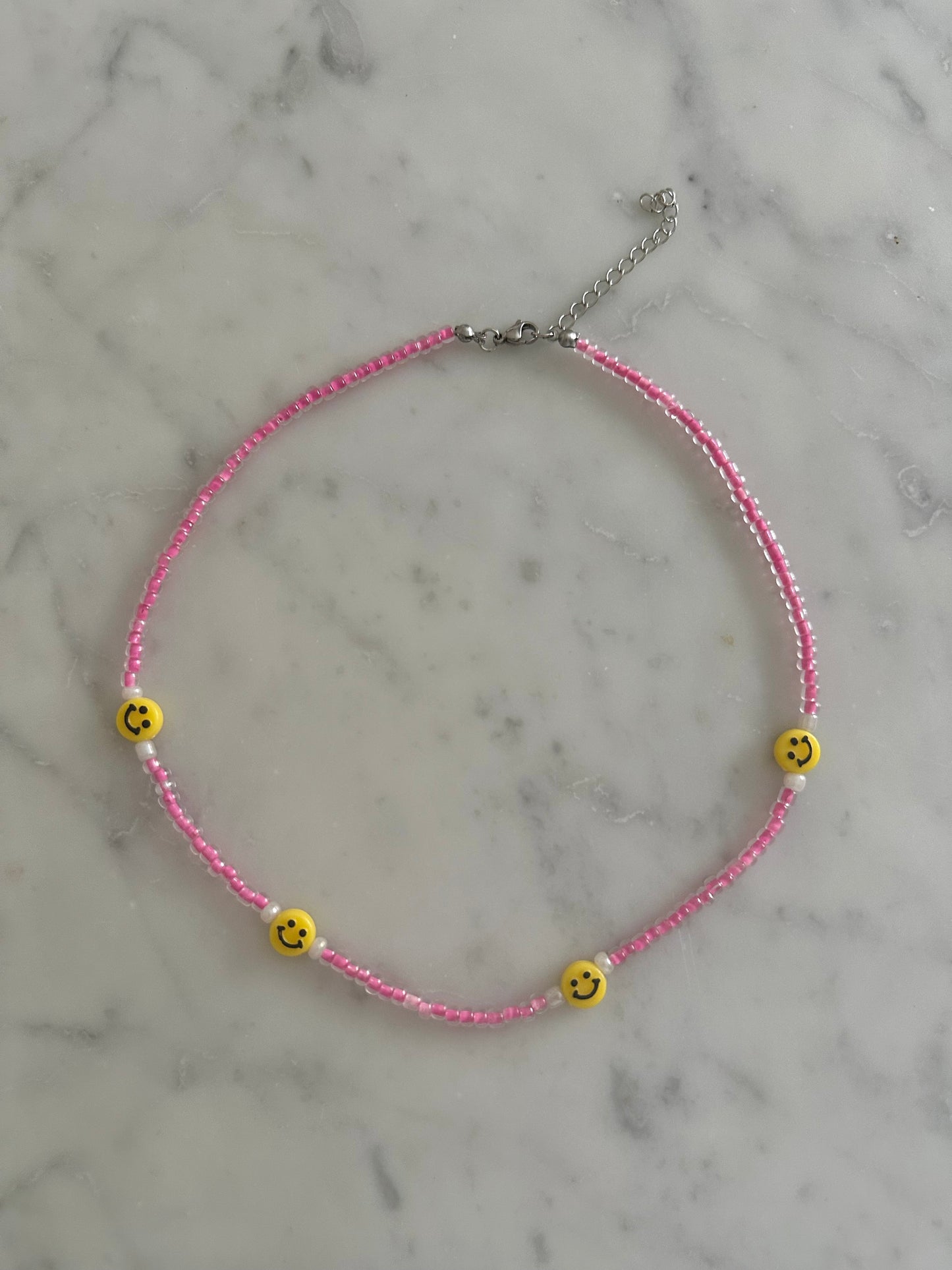 pink smiley necklace