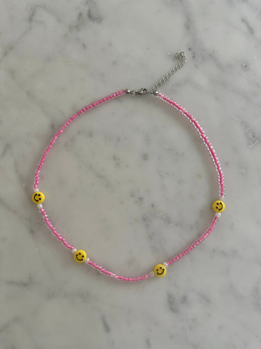 pink smiley necklace