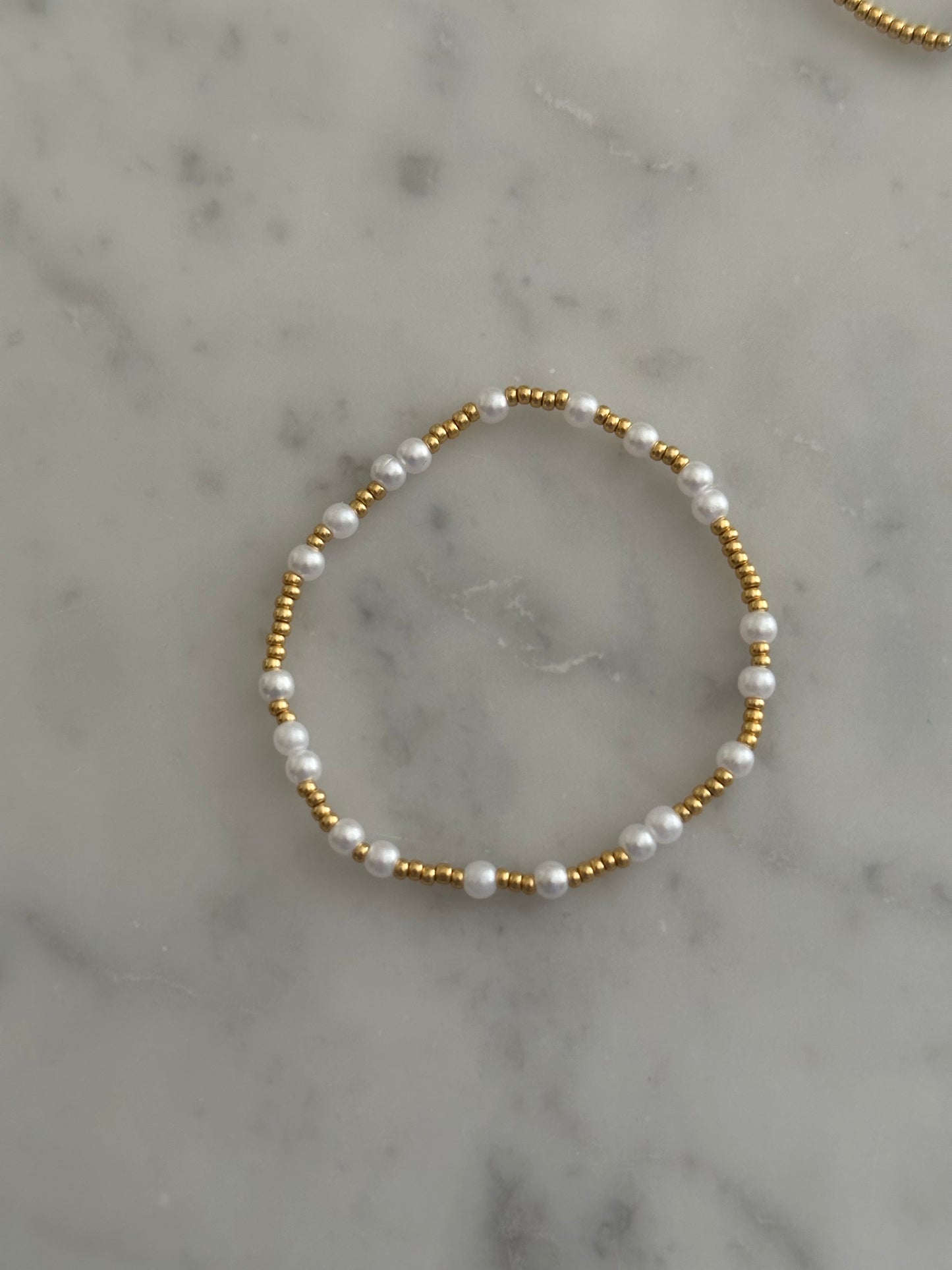 gold and pearl stacking bracelet