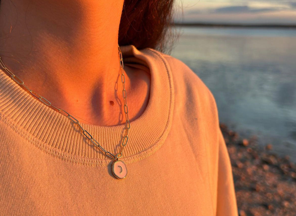 white enamel moon necklace