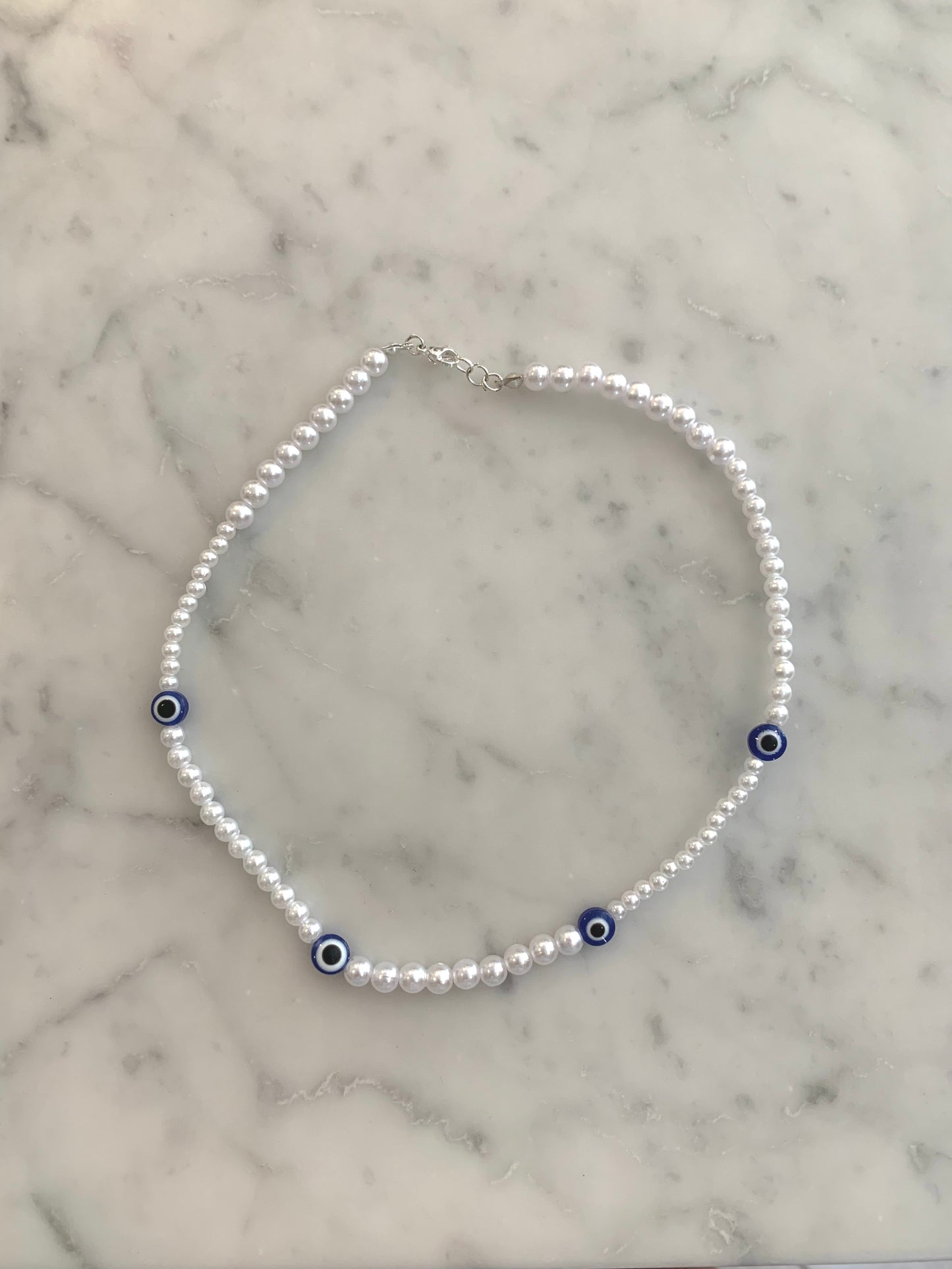 evil eye pearl choker