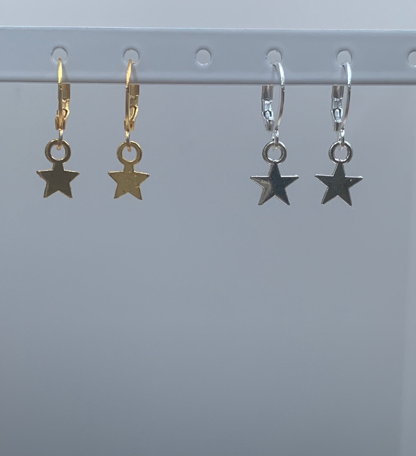 star huggie earrings