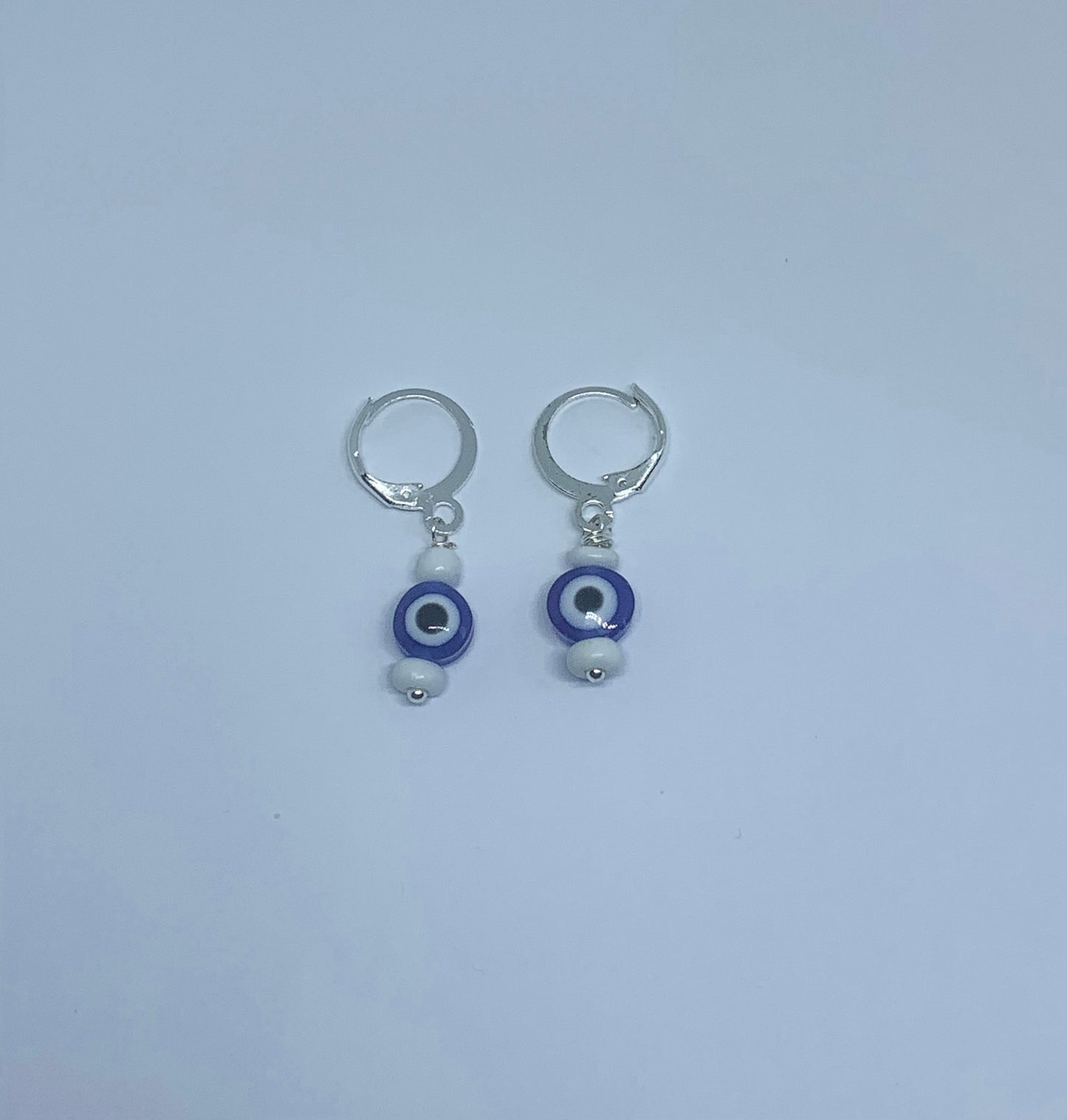 evil eye huggie earrings