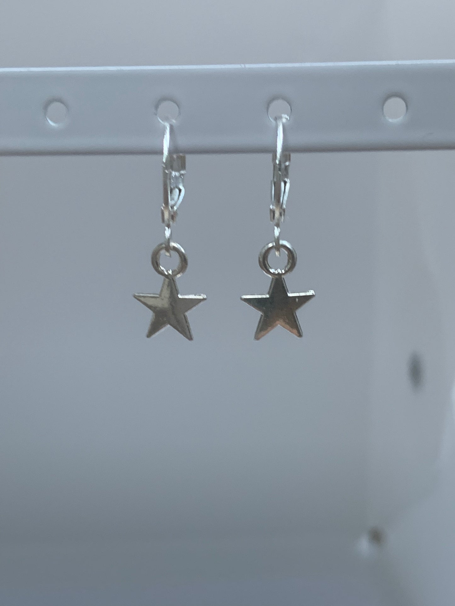 star huggie earrings