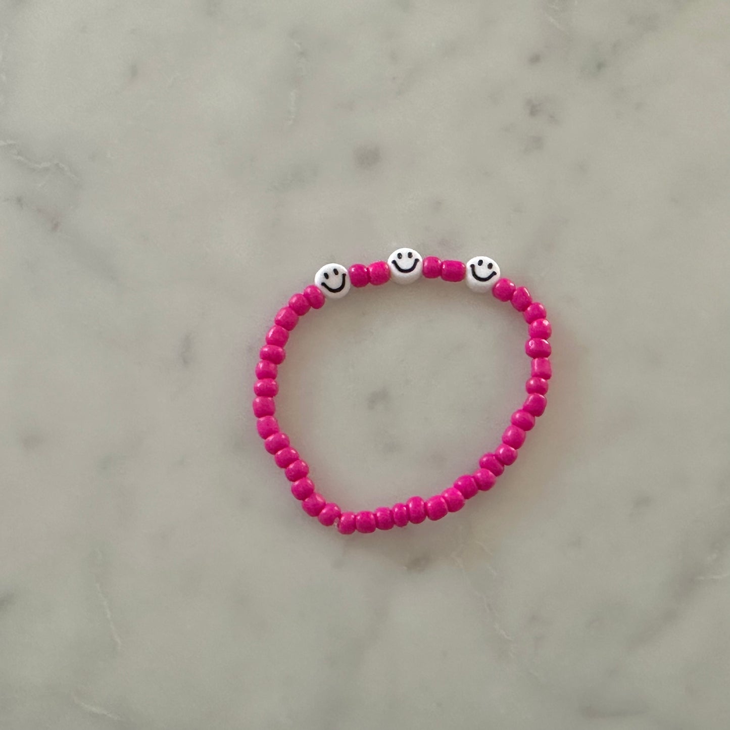 hot pink smiley bracelet