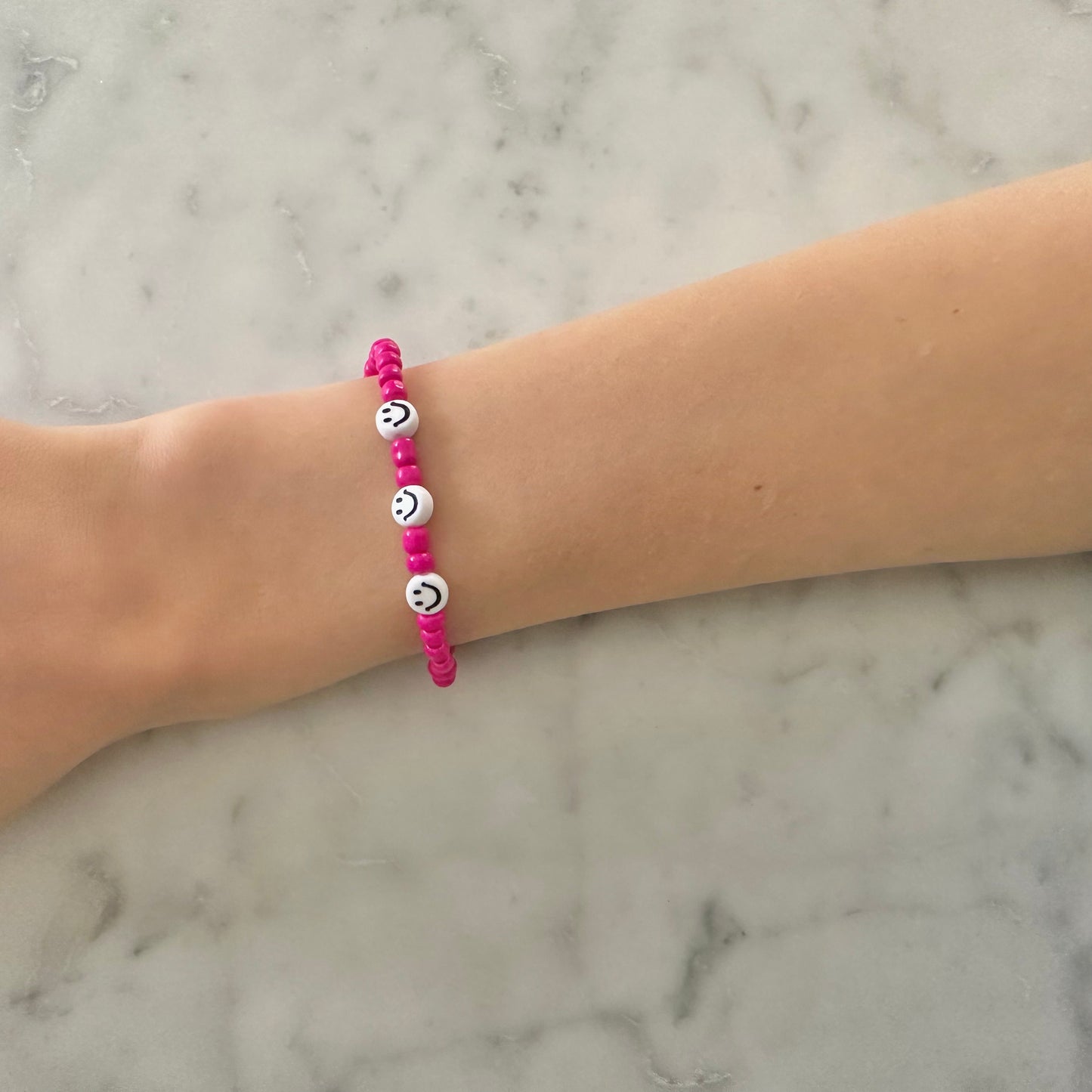 hot pink smiley bracelet